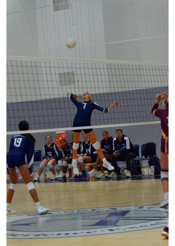 During the JV game, Brooklyn Montgomery focuses on her hit.